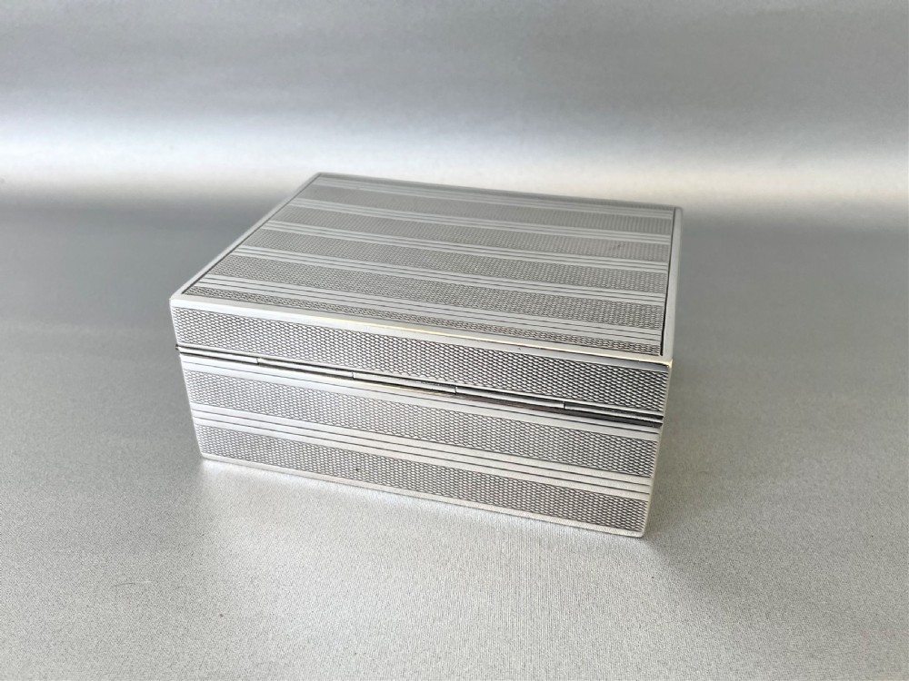 A fabulous Art Deco silver table cigarette box View X