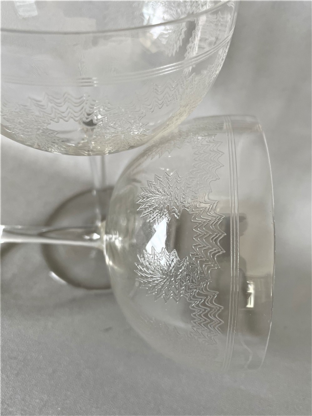 A charming pair of etched Edwardian champagne coupes View V