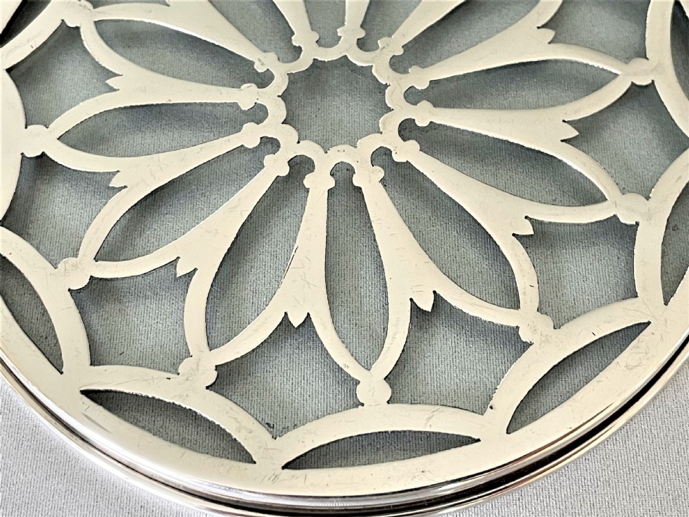 A delightful small silver teapotstand/coaster View III