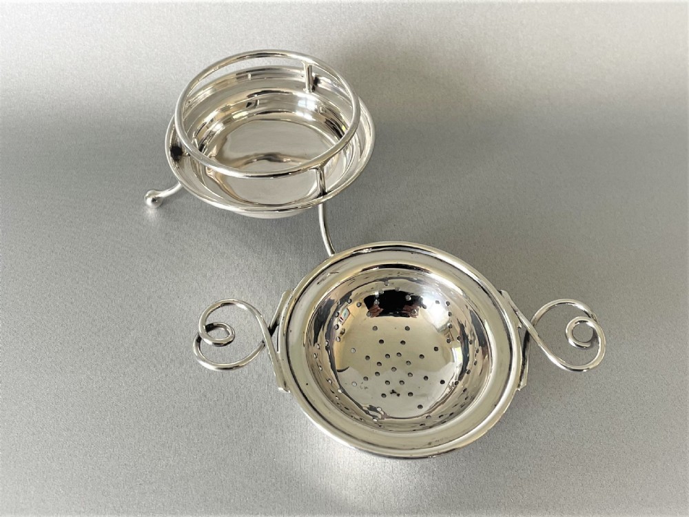 A Chester silver tea strainer & matching drip cup View III