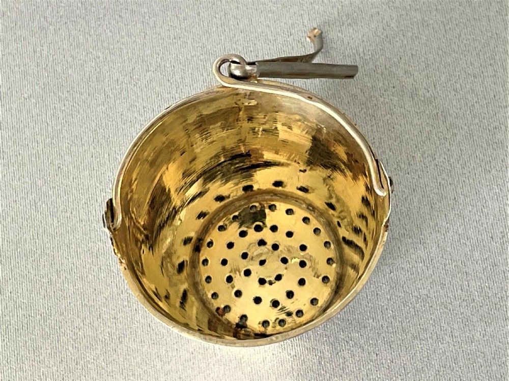 A superb pre-revolution Russian silver gilt novelty tea strainer View IX