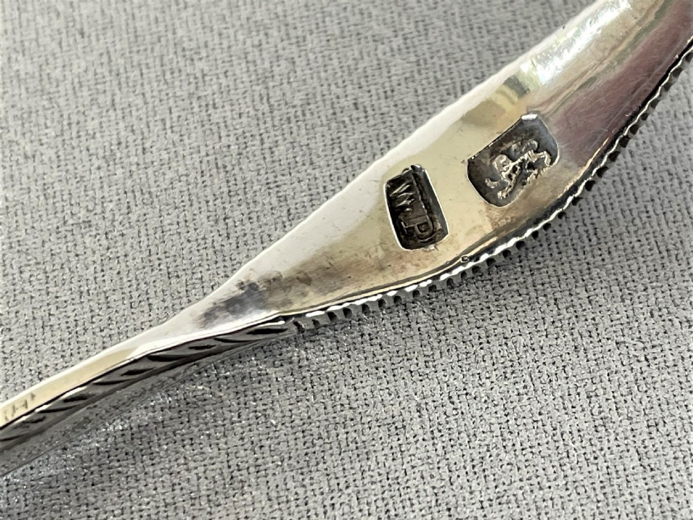 An extremely rare pair of 18th Century sprung silver tongs View IV