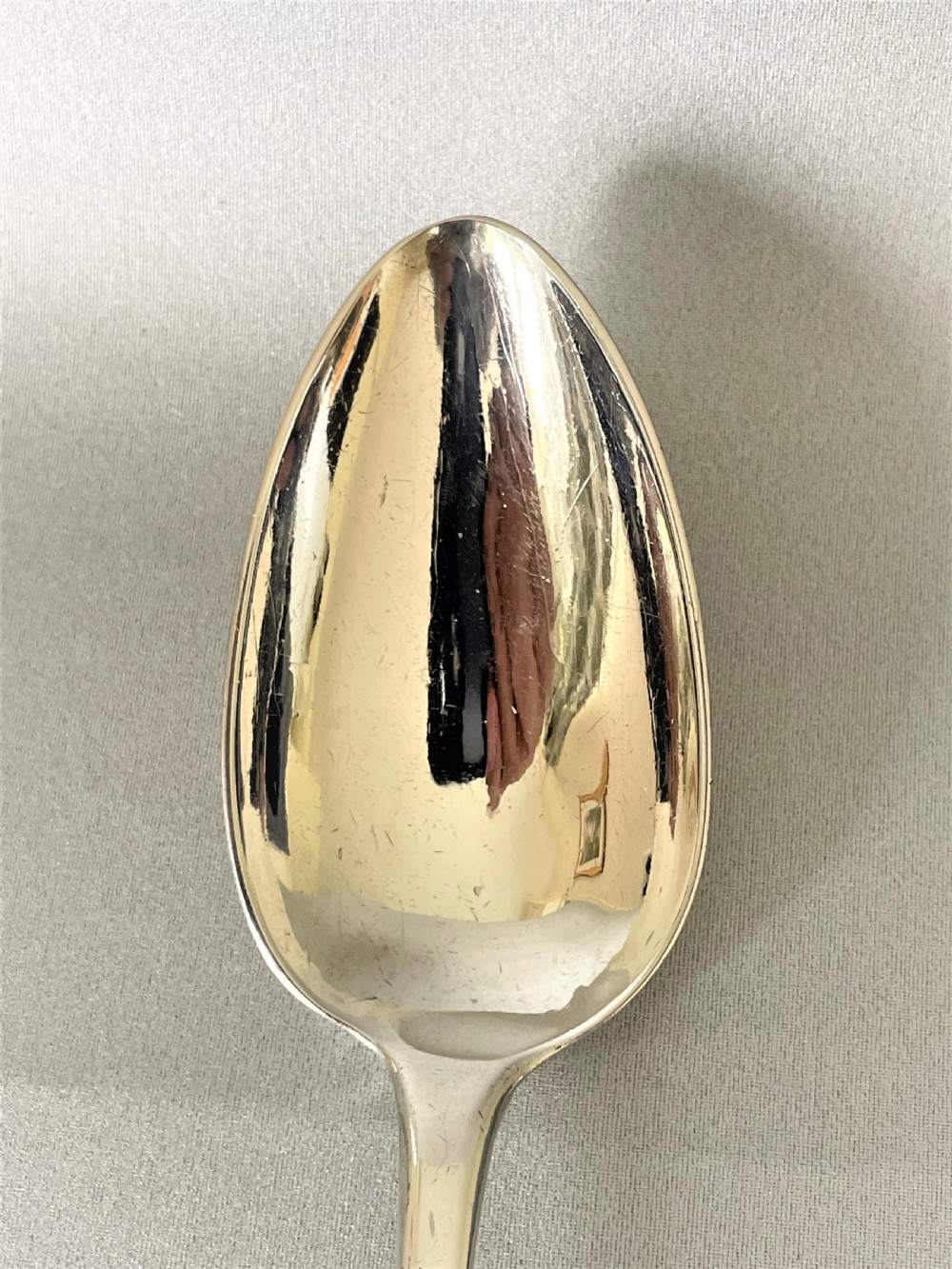 A handsome Georgian Scottish silver table/serving spoon View II