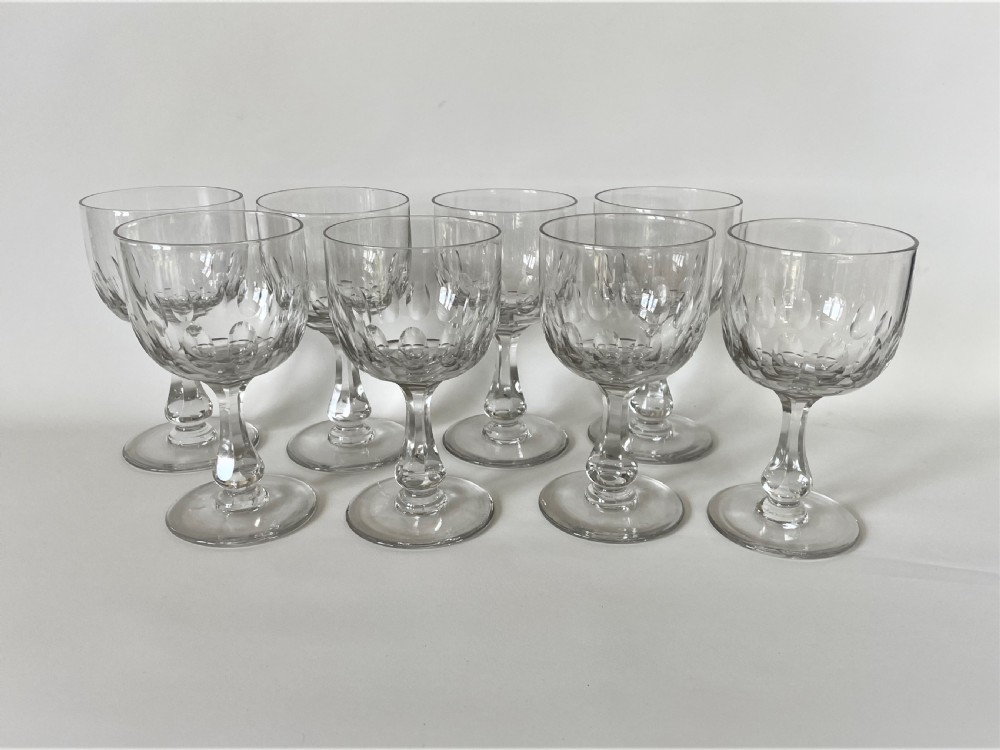 A fabulous set of 8 Edwardian cut glass wine goblets