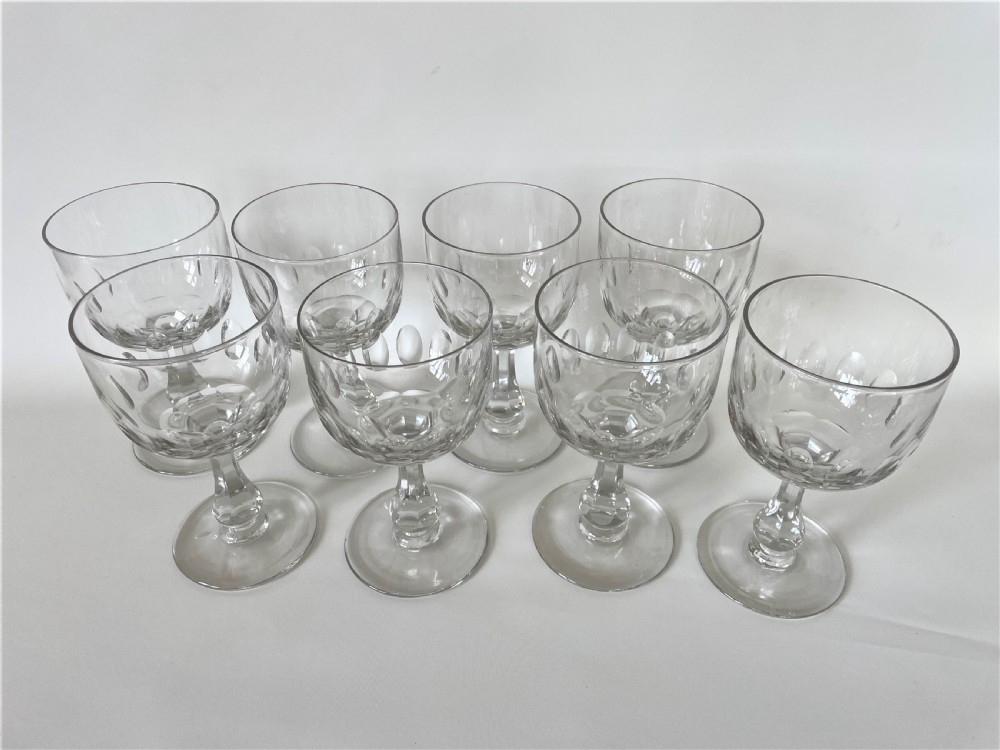 A fabulous set of 8 Edwardian cut glass wine goblets View II