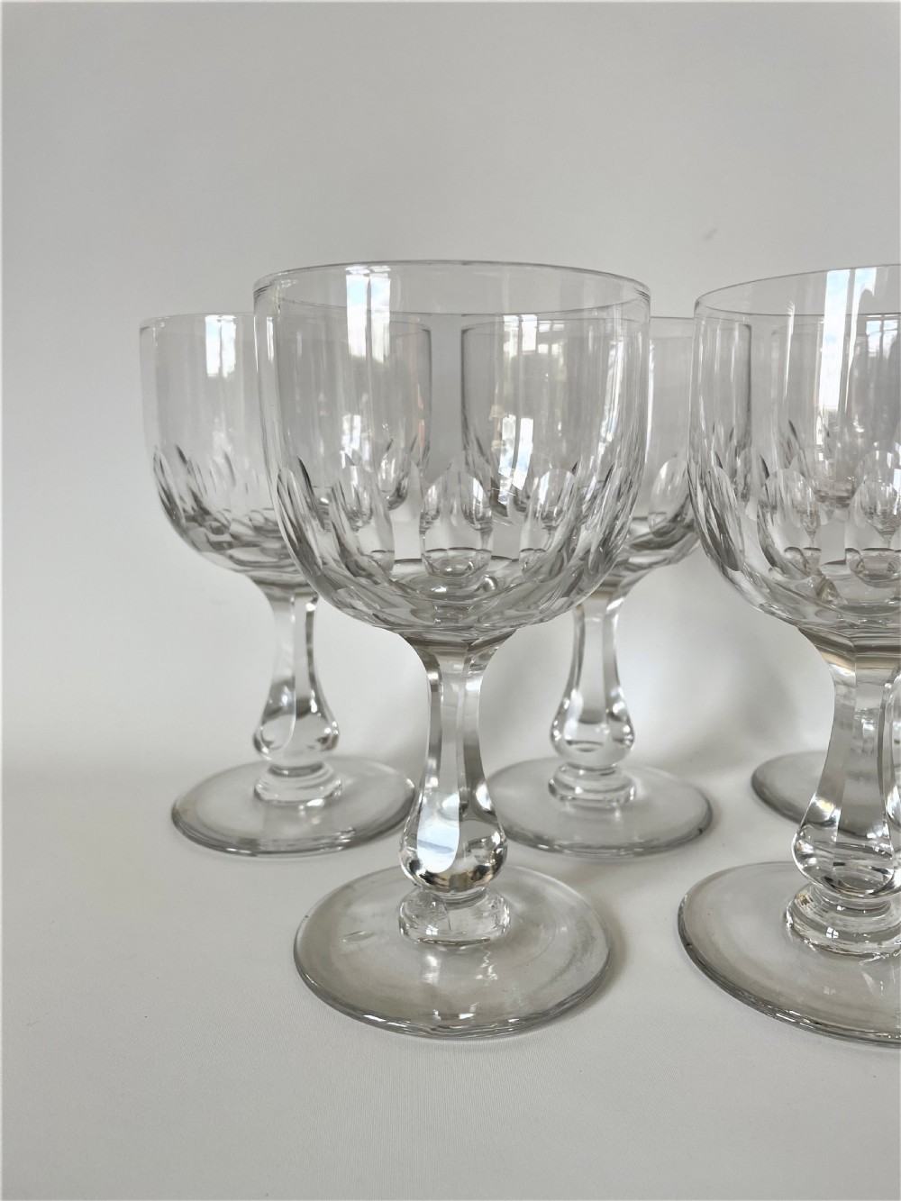 A fabulous set of 8 Edwardian cut glass wine goblets View III