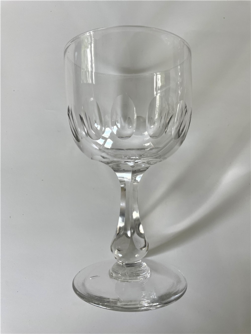 A fabulous set of 8 Edwardian cut glass wine goblets View V