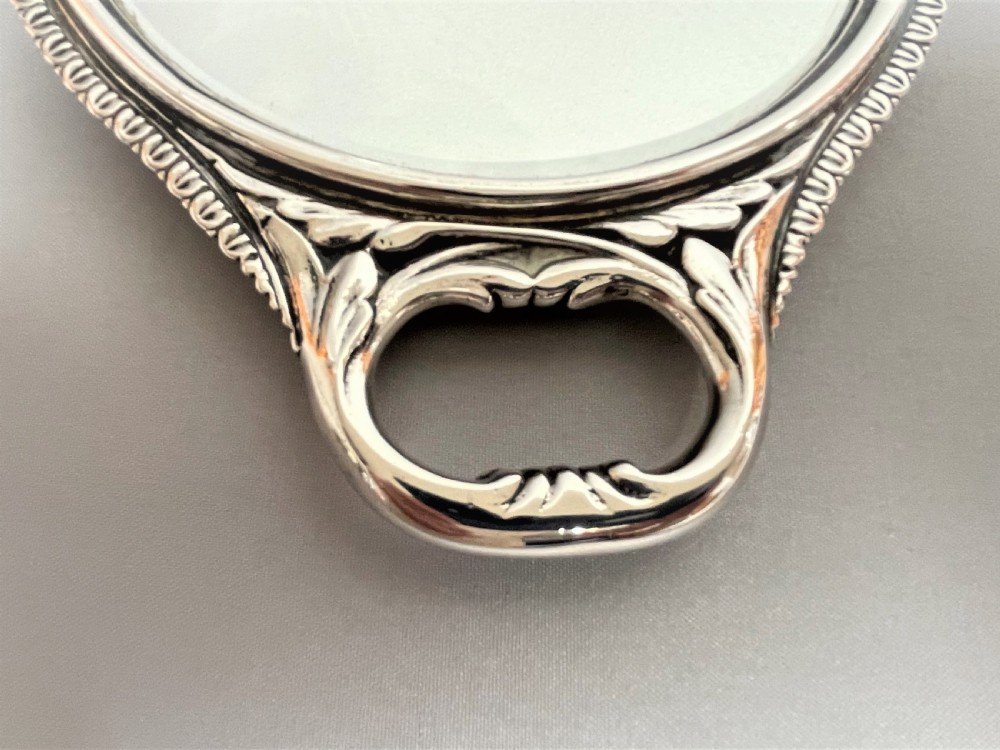 A William Comyns Victorian Silver Hand Mirror, Featuring Reynold's Angels View IV