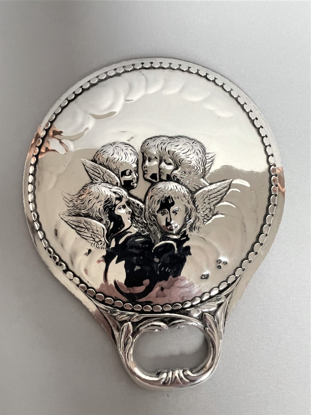 A William Comyns Victorian Silver Hand Mirror, Featuring Reynold's Angels View V