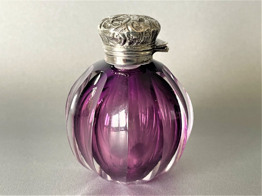A stunning Victorian silver topped amethyst glass scent bottle View VI