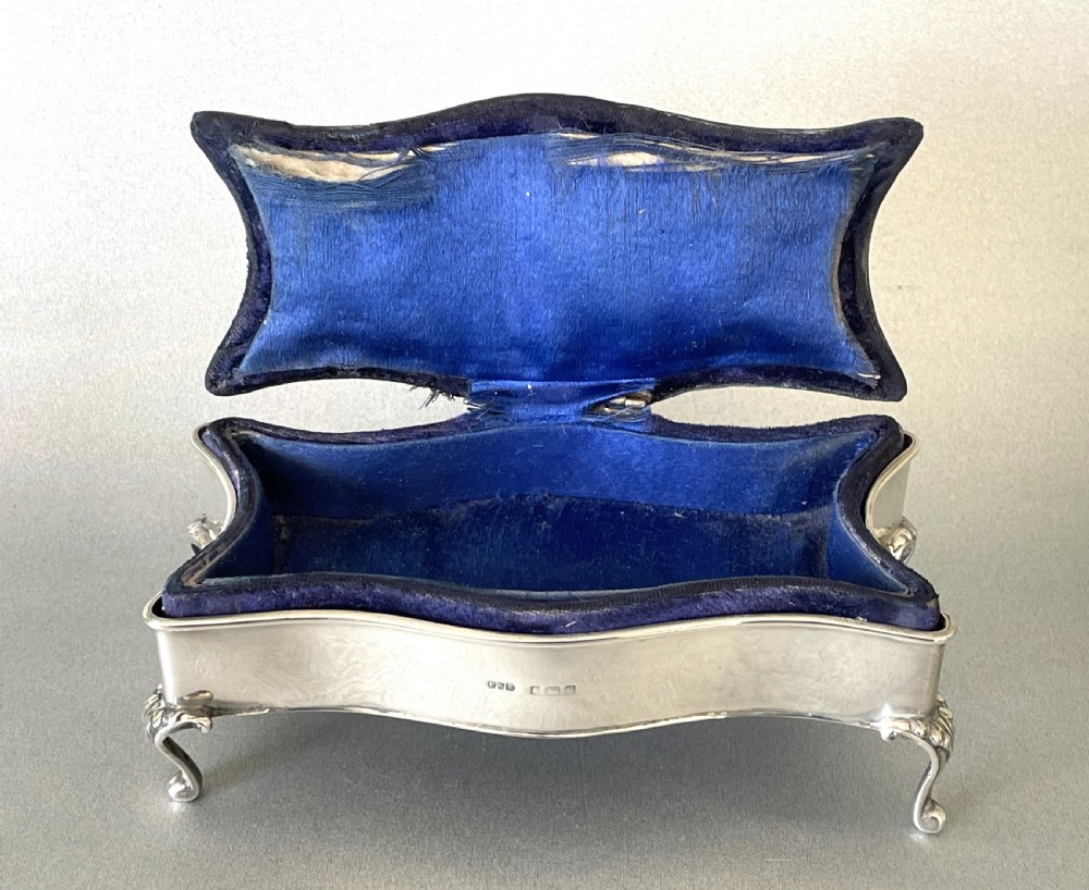 An Edwardian silver trinket box with pin cushion lid View III