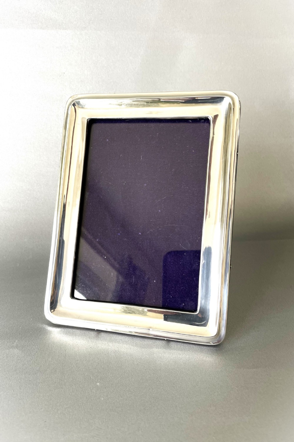 A stylish George V silver photo frame
