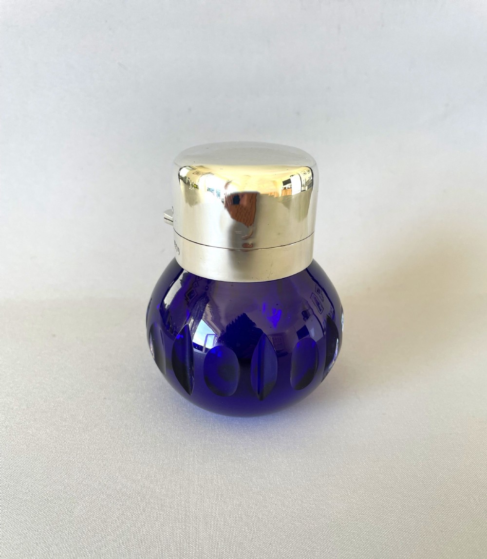 A gorgeous Victorian silver mounted cologne bottle View II
