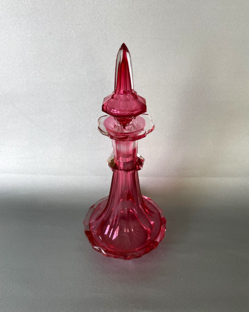 A gorgeous Victorian Gothic cranberry glass cologne bottle View II