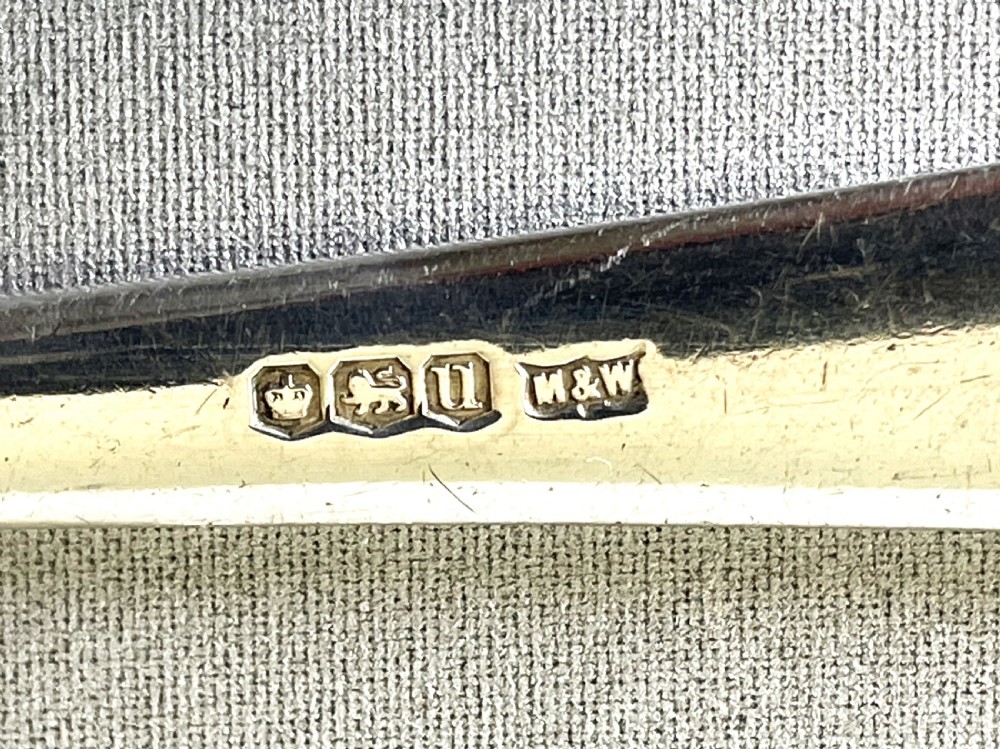 A quality set of 6 Onslow patter silver dessert spoons View V
