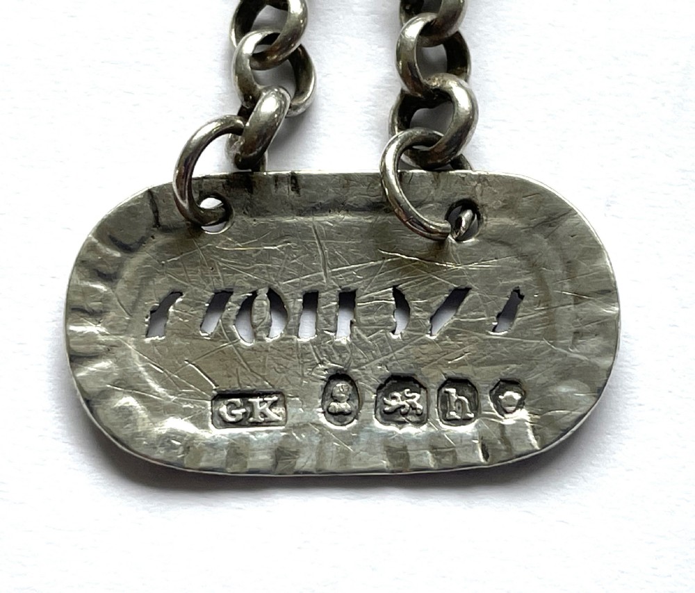 A rare George IV silver anchovy bottle ticket View IV