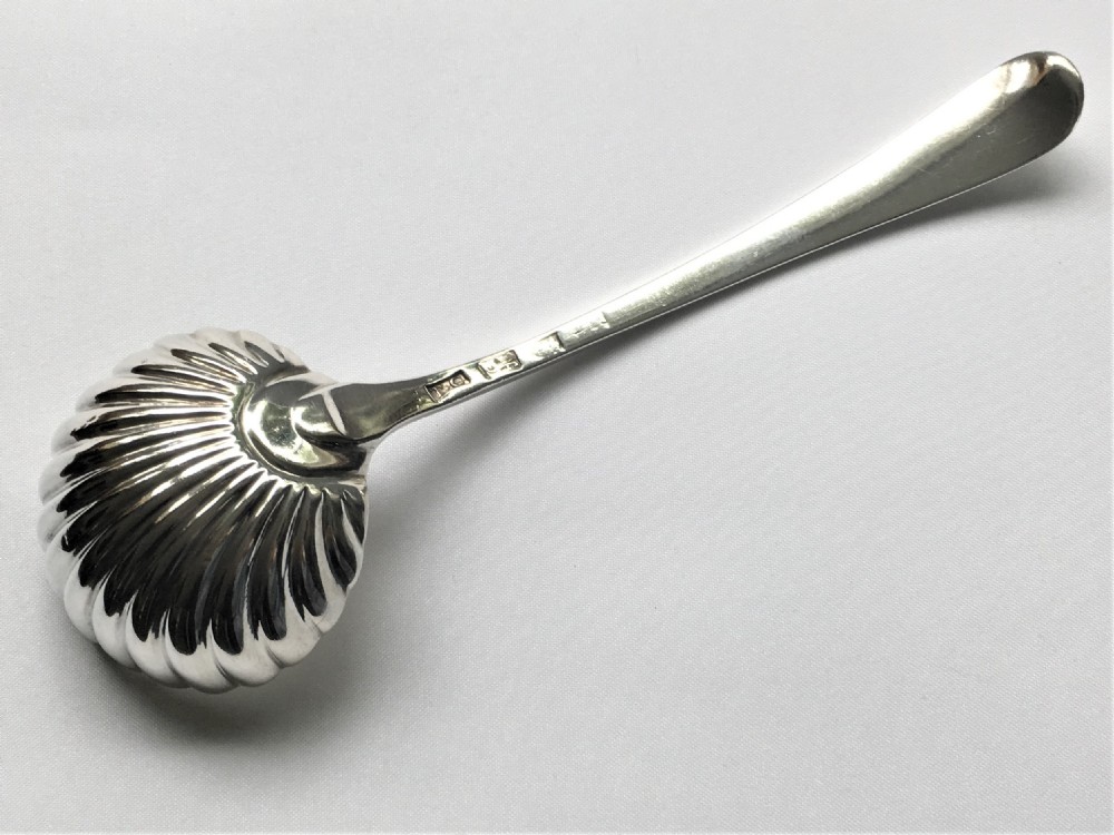 An attractive 18th Century silver gravy ladle View III