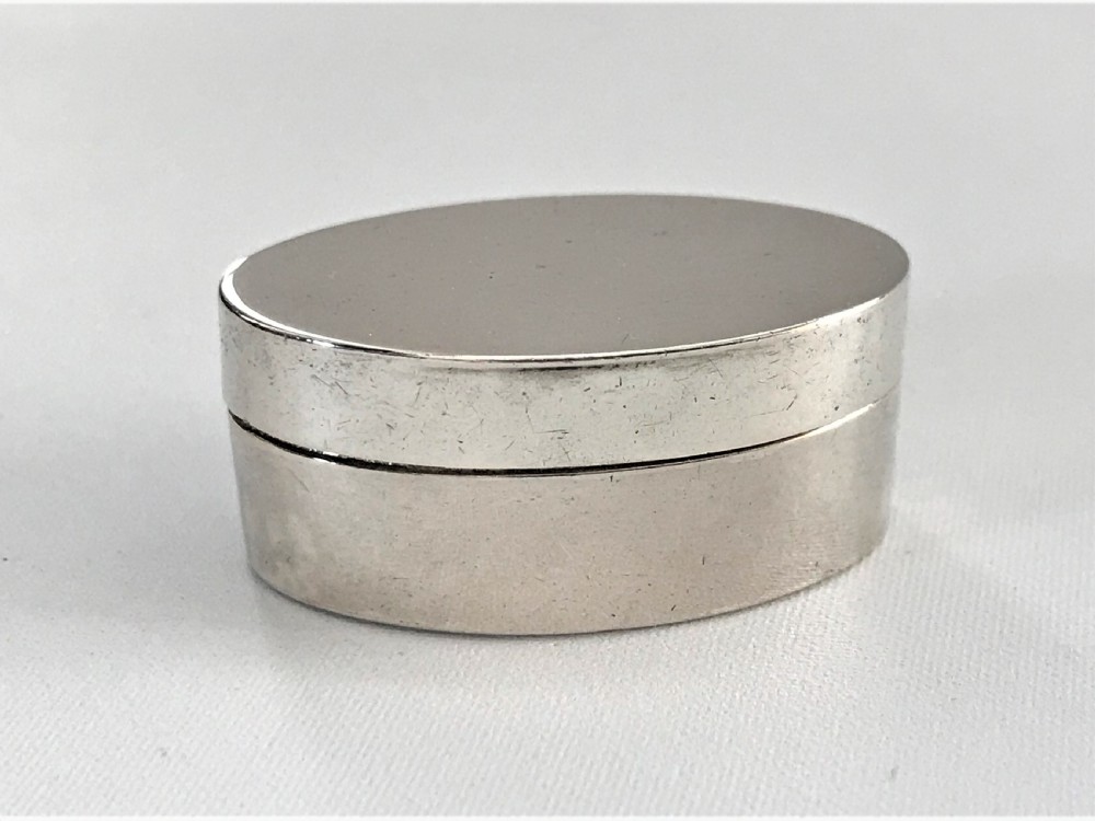 An unusual 18th Century hinged silver patch box View II