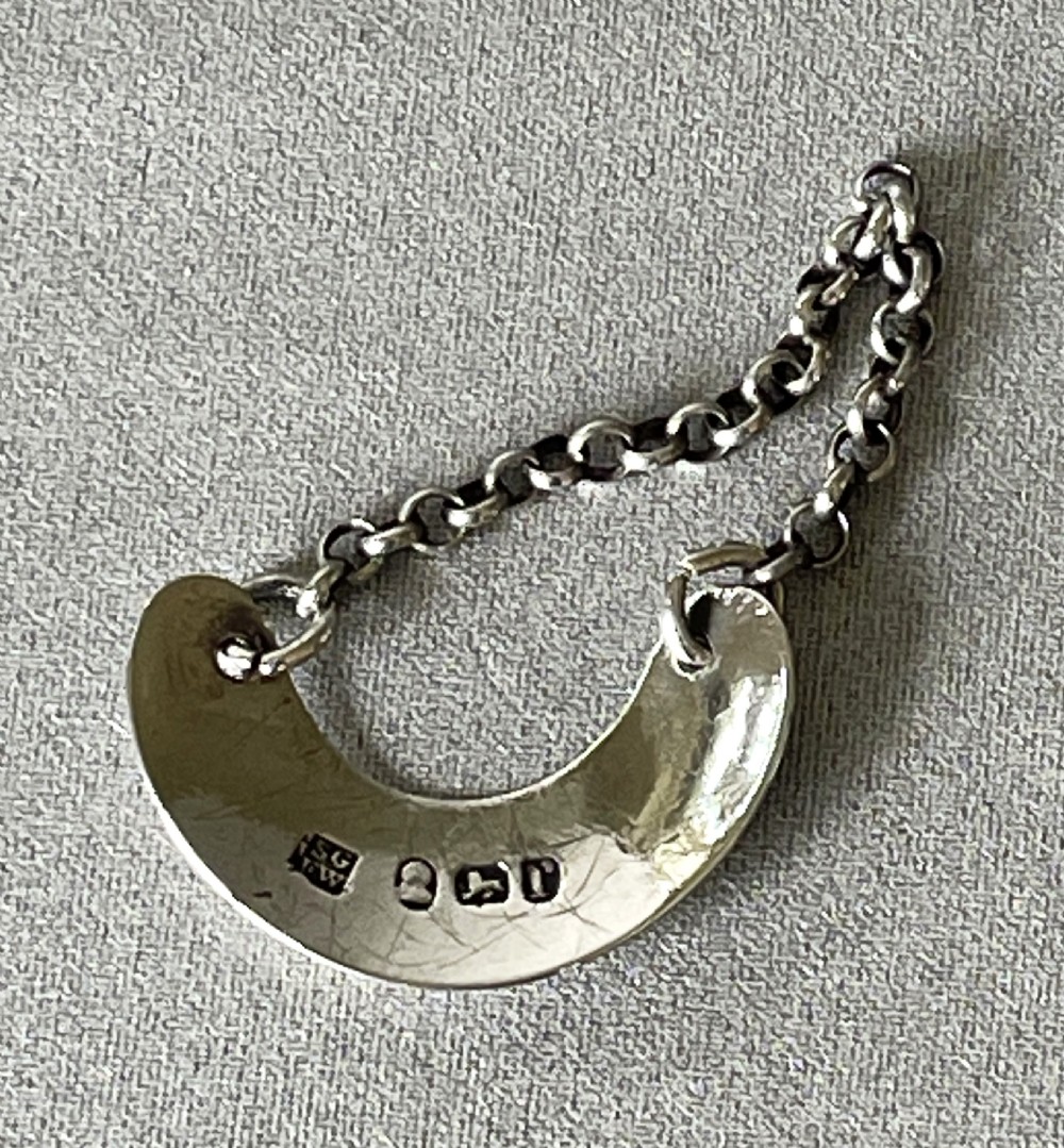 A rare 18th Century silver 'Kyan' bottle ticket View III