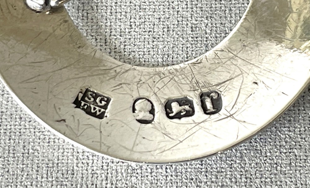 A rare 18th Century silver 'Kyan' bottle ticket View IV