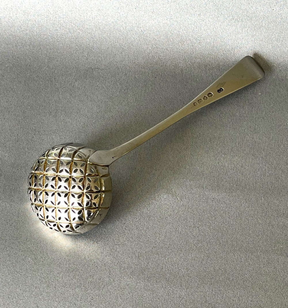 A fine George Adams Victorian silver gilt sifting ladle View V