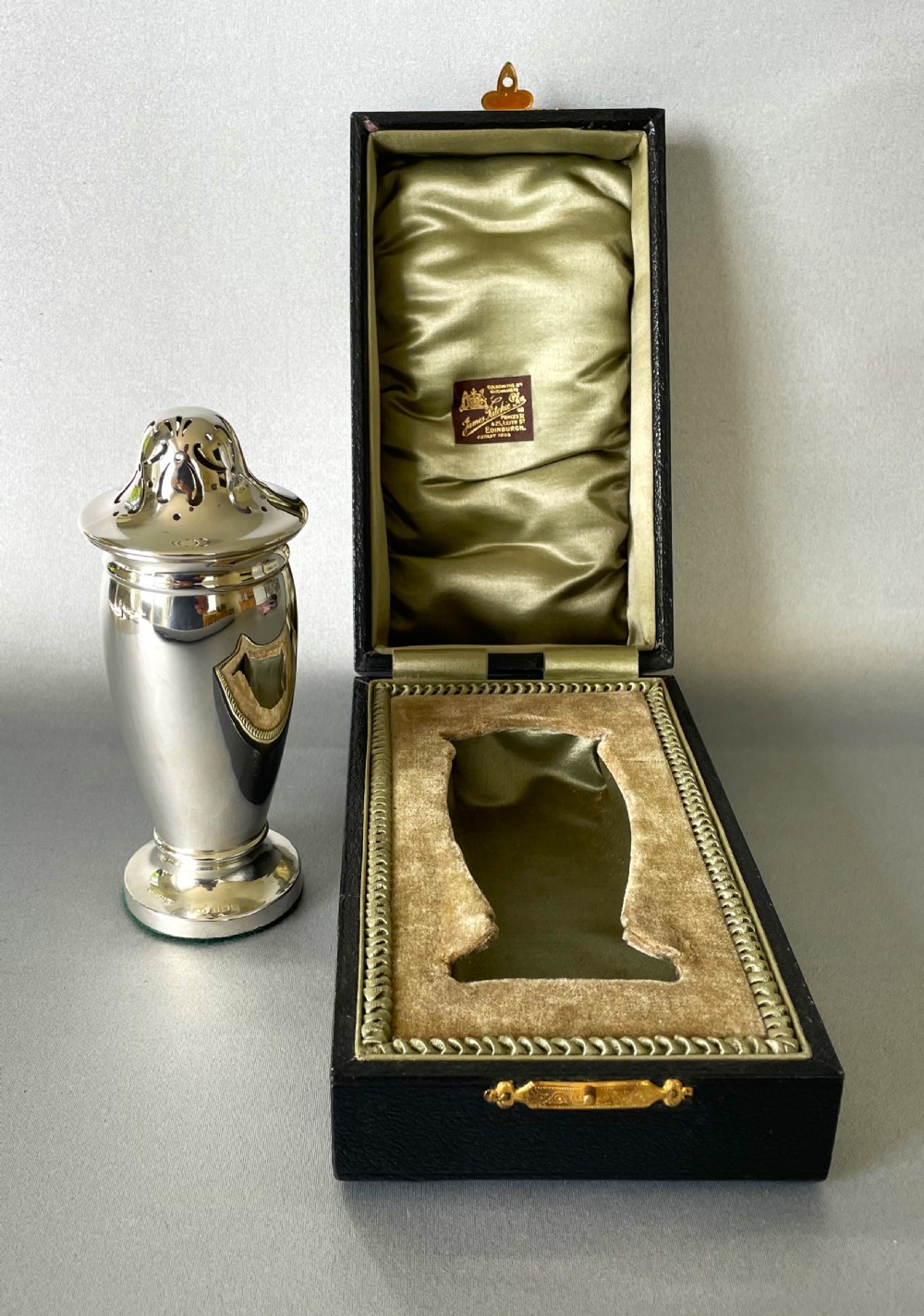 A gorgeous boxed silver sugar caster View II