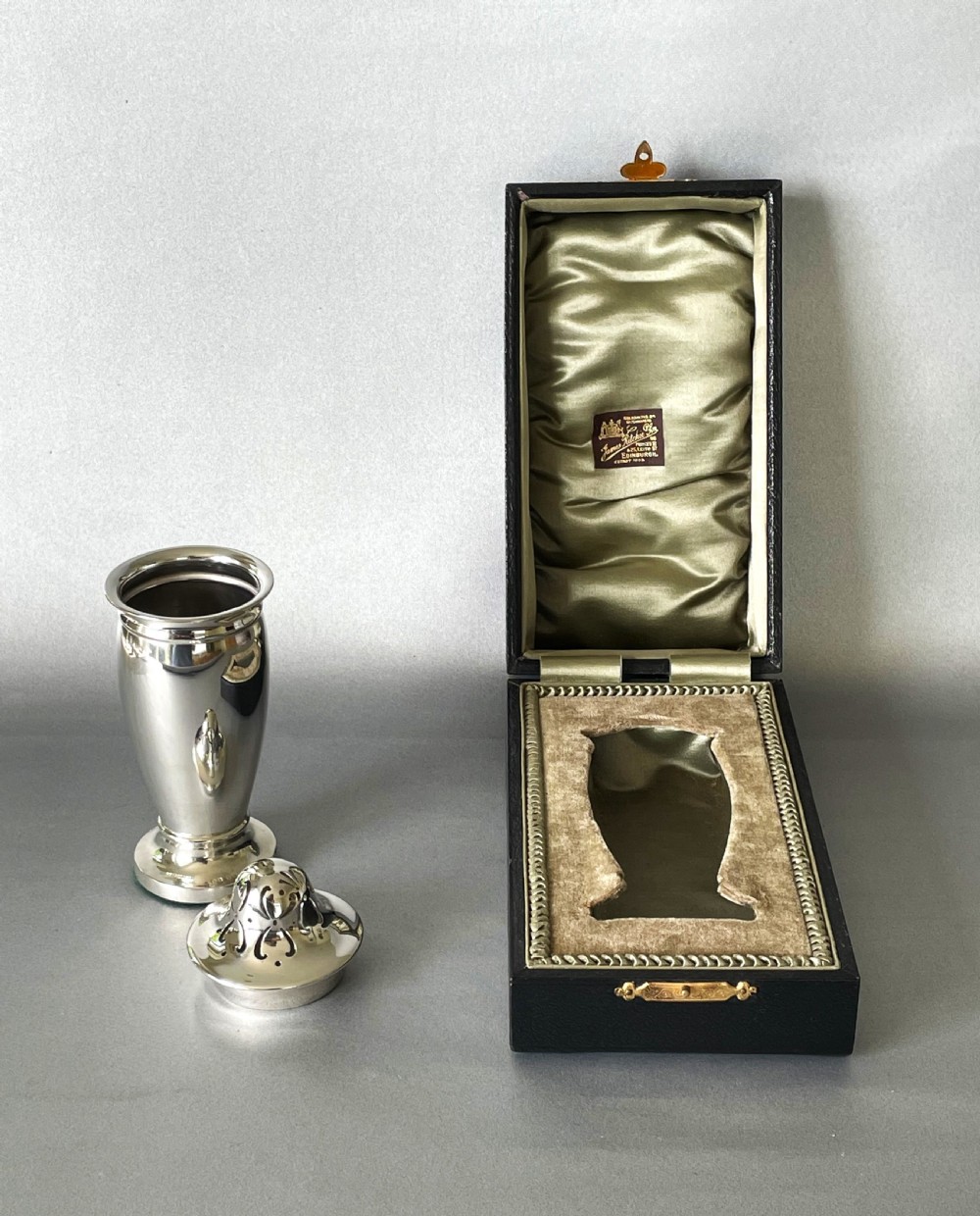 A gorgeous boxed silver sugar caster View VII