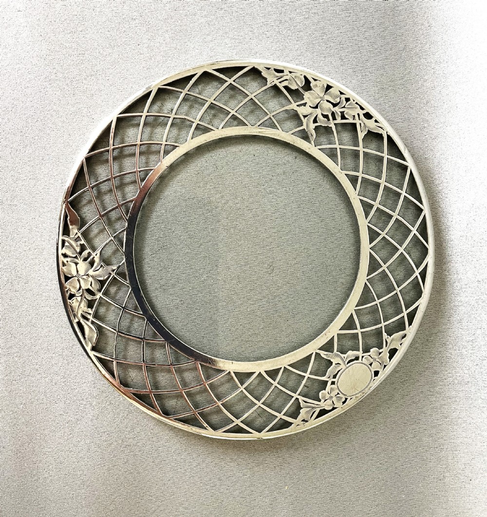 A lovely Sterling silver pierced teapot stand or coaster View II