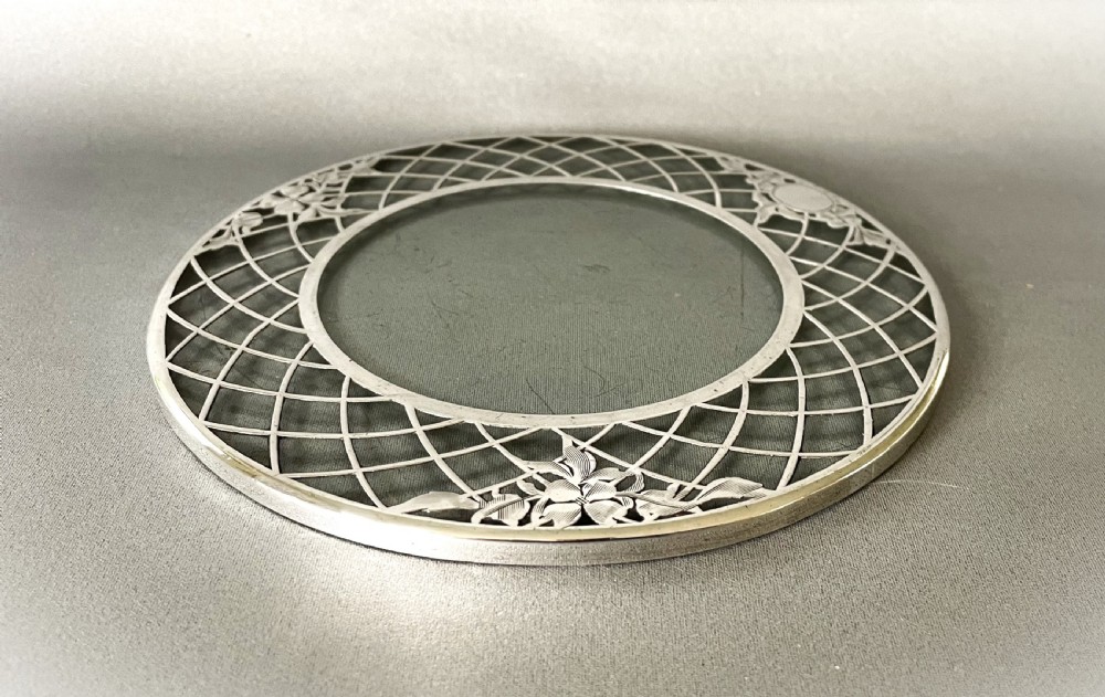 A lovely Sterling silver pierced teapot stand or coaster View III