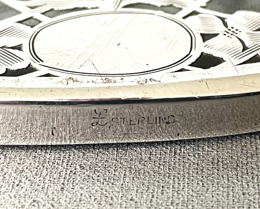 A lovely Sterling silver pierced teapot stand or coaster View IV