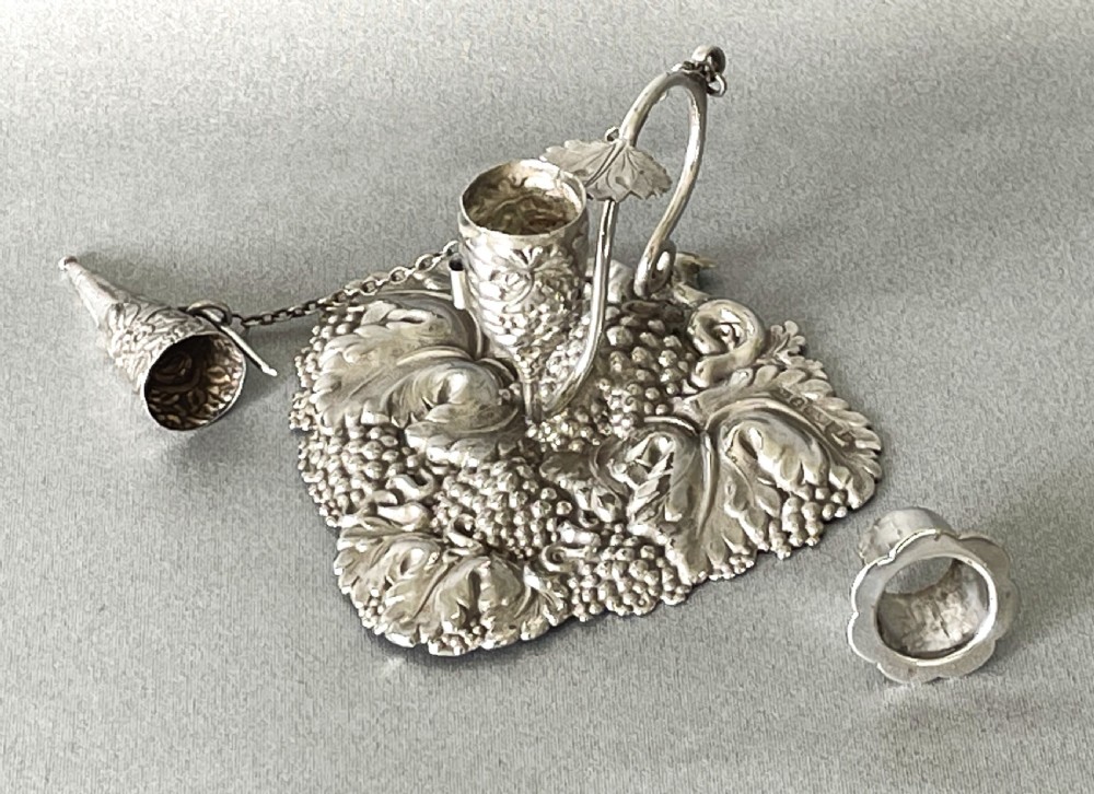 A delightful Georgian small silver chamber stick View III