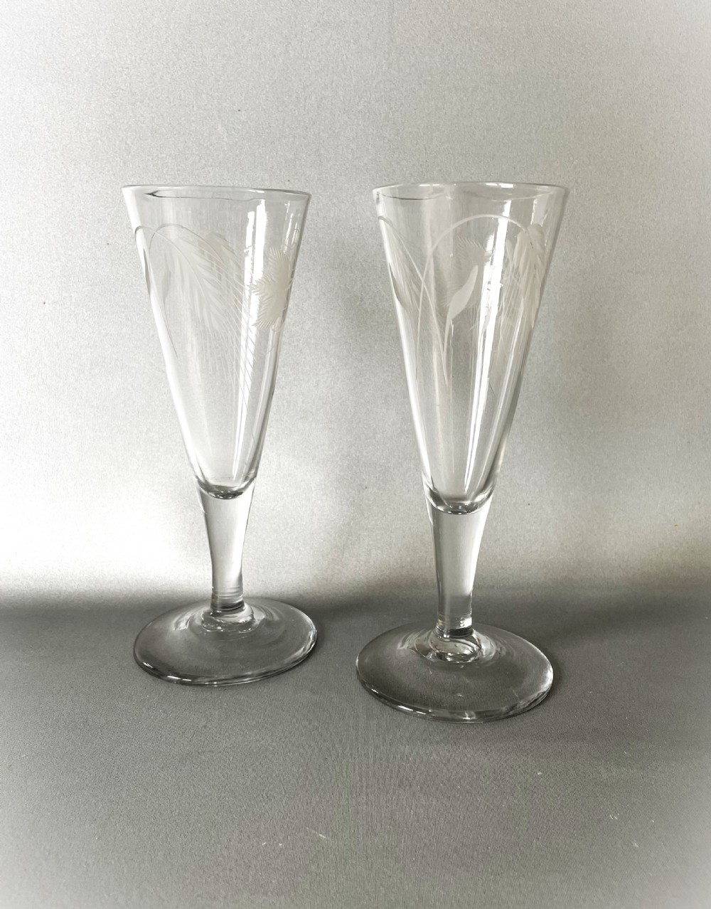 A fine pair of 18th Century etched ale glasses