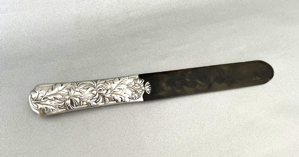 A fabulous Edwardian silver & tortoiseshell page turner
