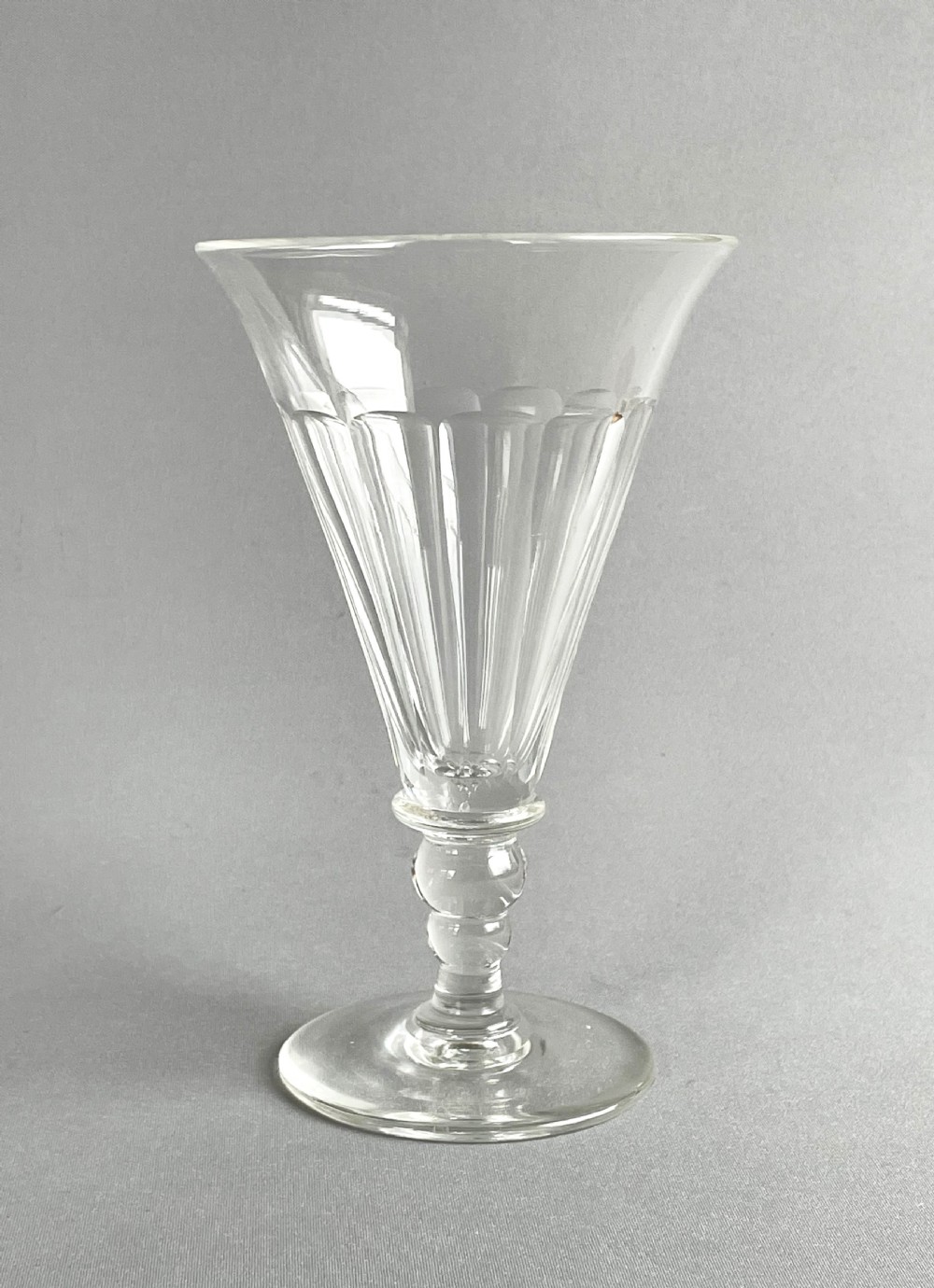 A large Victorian cut glass wine flute