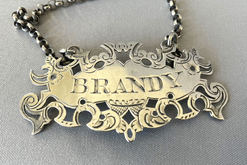 A gorgeous Victorian silver Brandy decanter label View II