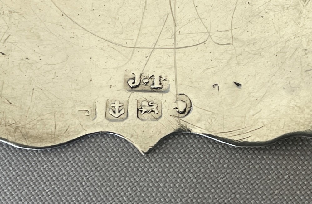 A desirable pair of Victorian silver Rum & Gin decanter labels View VI