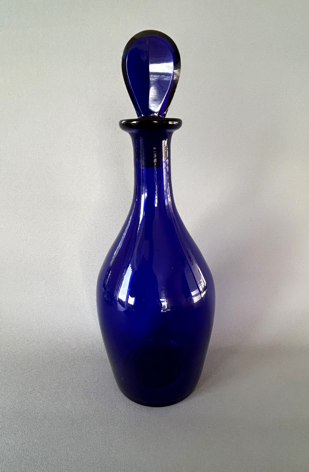 A gorgeous Georgian Bristol Blue liqueur decanter