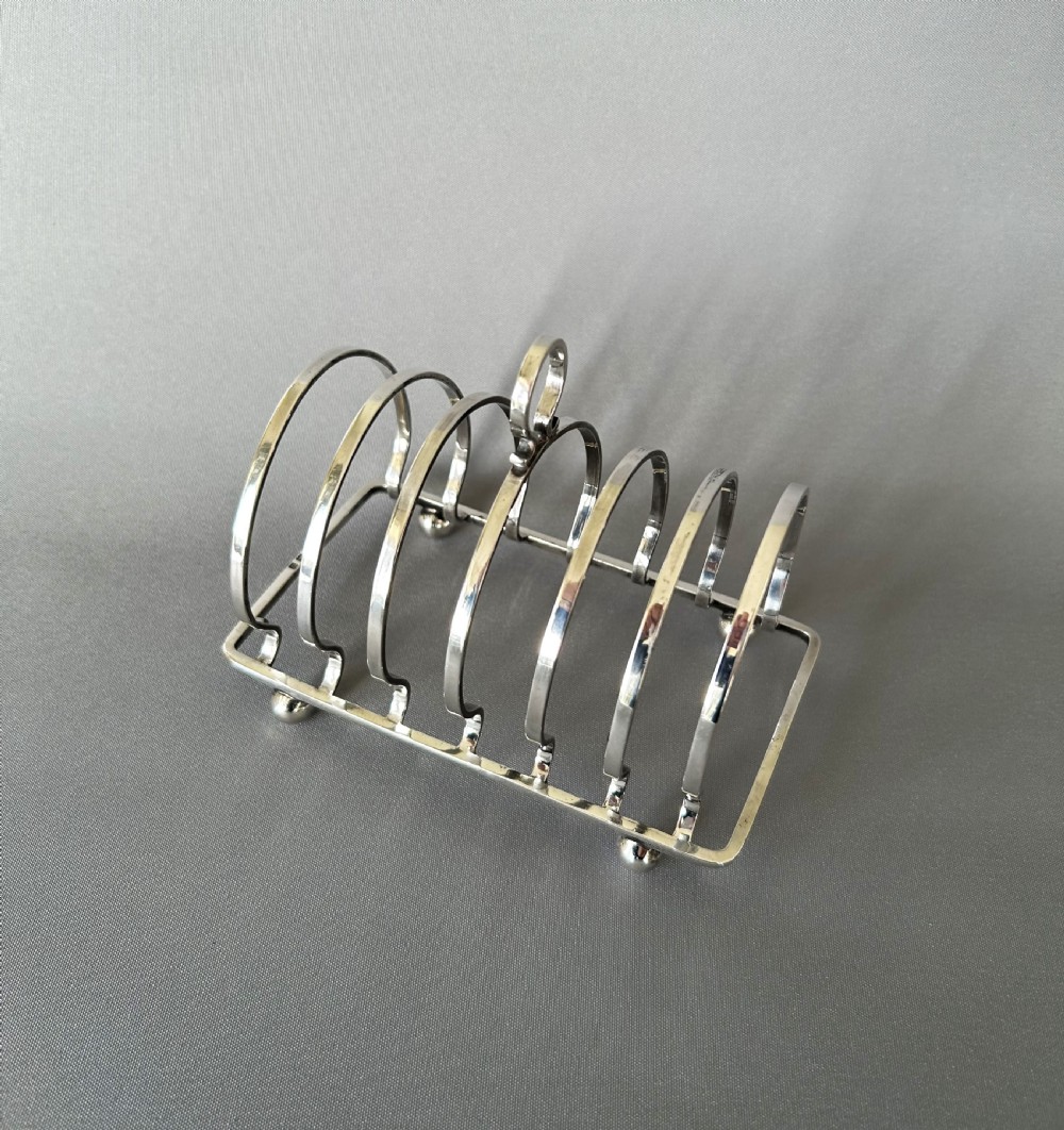 A handsome 6 slice silver toast rack View III