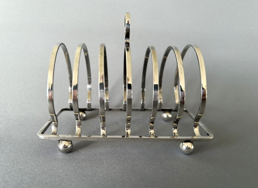 A handsome 6 slice silver toast rack View IV