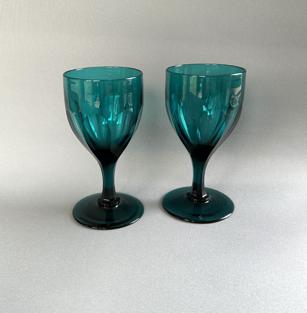 A lovely pair of Victorian aqua green wine glasses