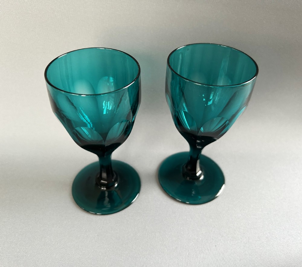 A lovely pair of Victorian aqua green wine glasses View II