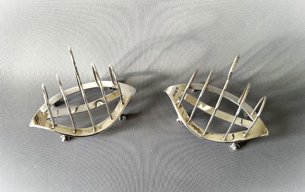 A gorgeous pair of late Victorian silver toast racks View III