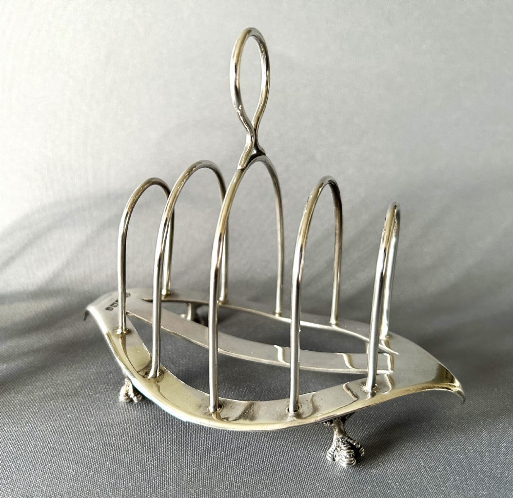 A gorgeous pair of late Victorian silver toast racks View IV
