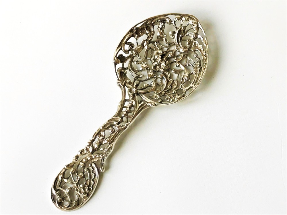 A lovely William Comyns Victorian cast silver bonbon spoon