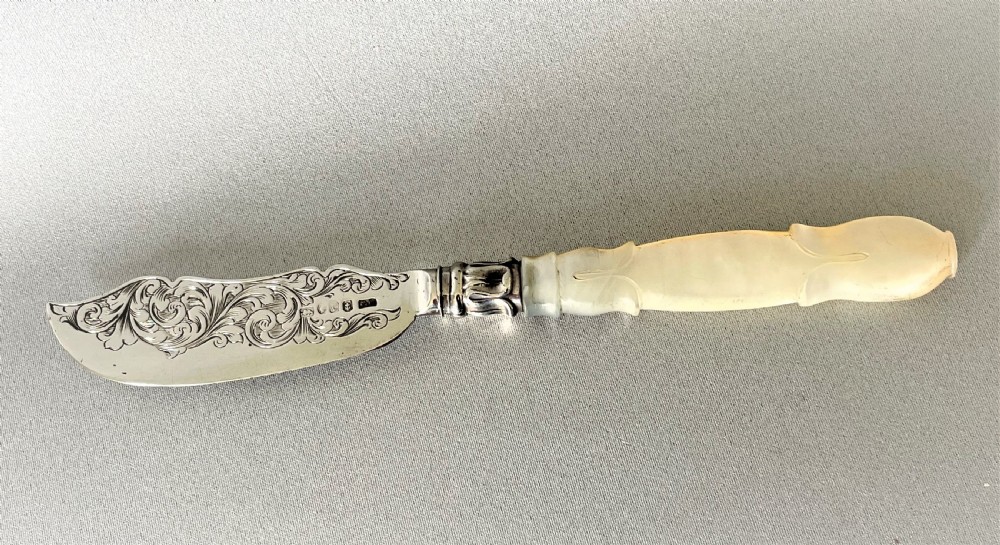 An early Victorian silver & mother-of-pearl butter knife