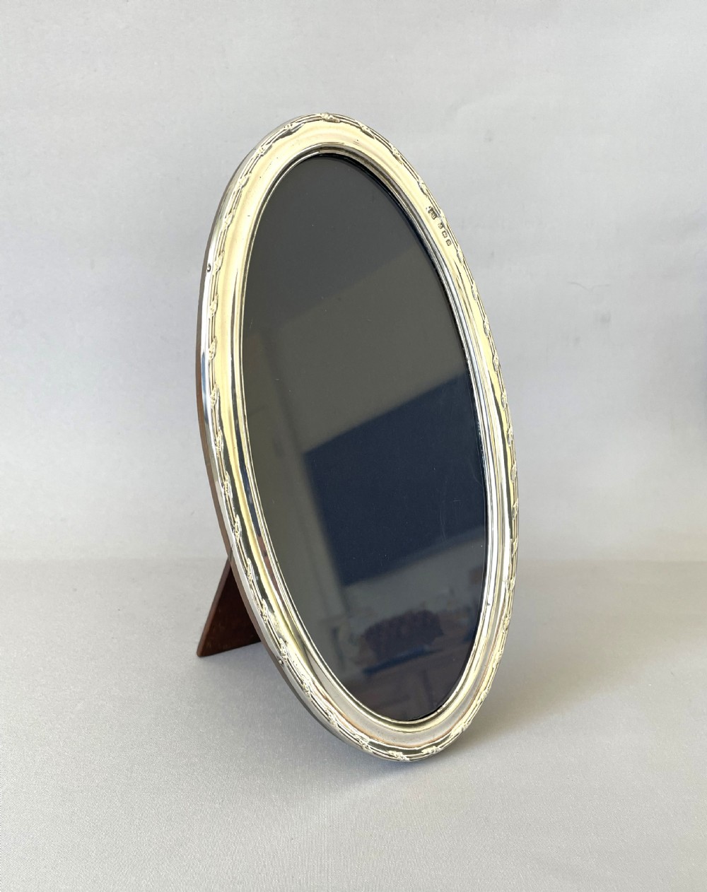 An Unusual George V Oval Silver Photo Frame