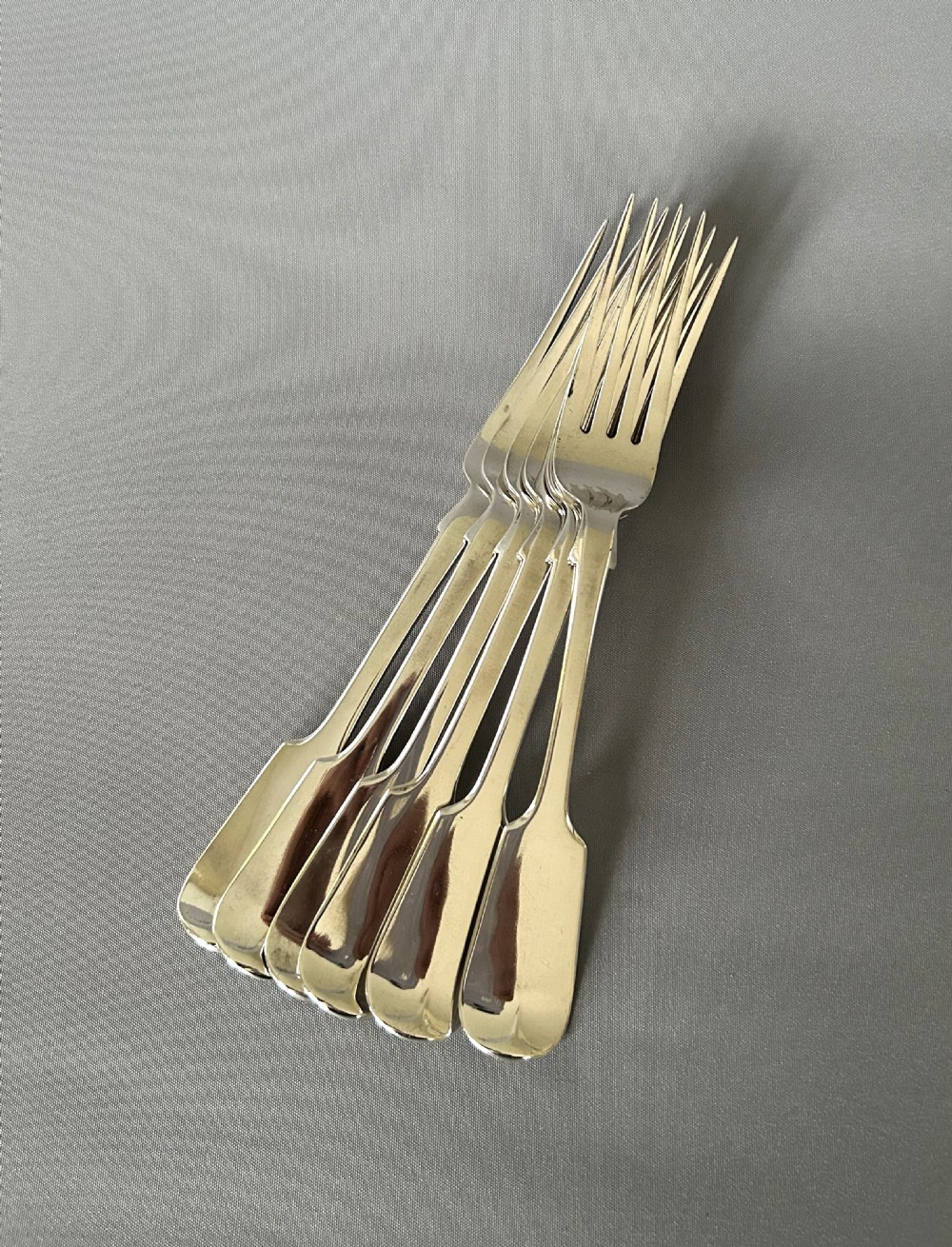 A substantial set of 6 early Victorian silver table forks