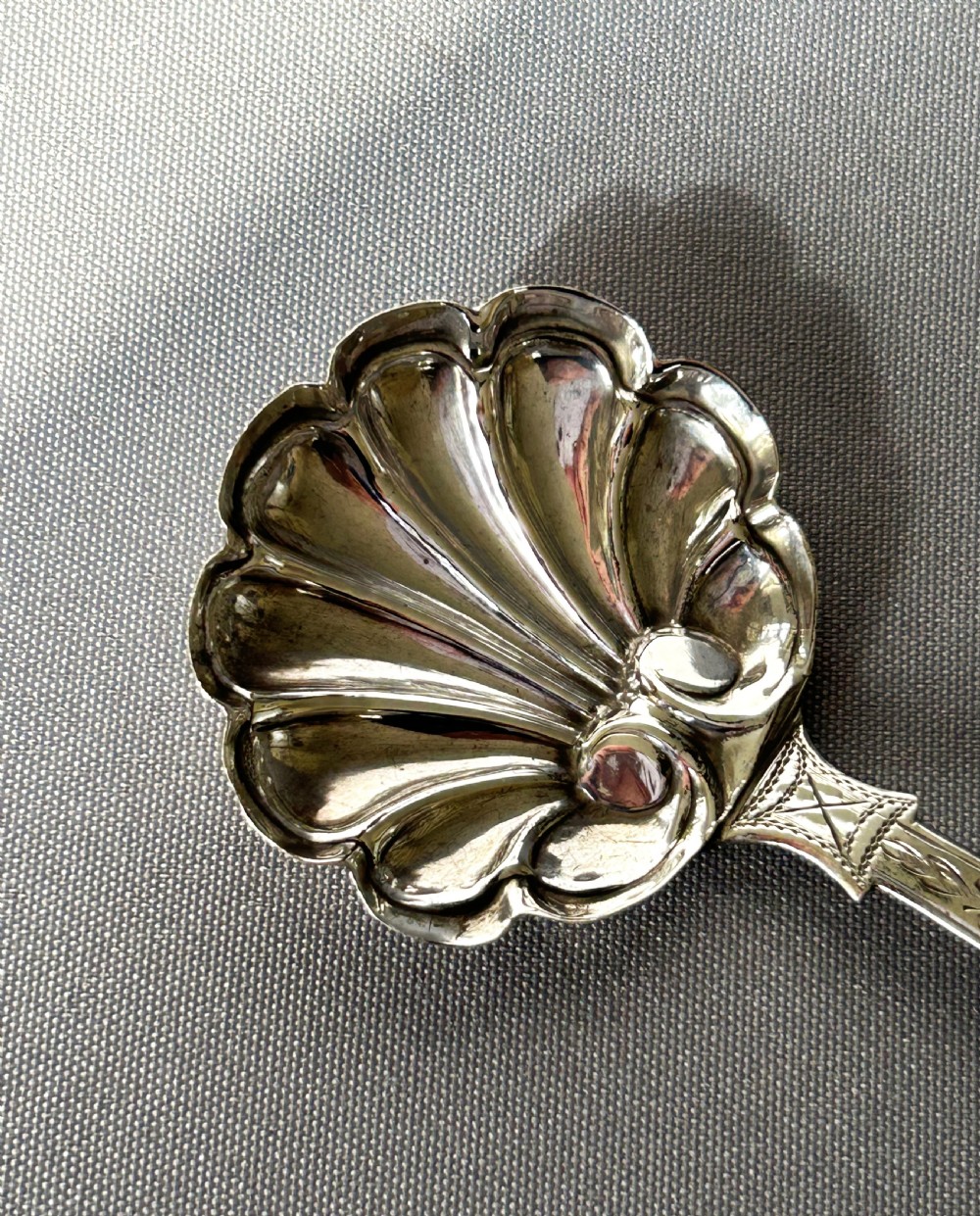 An unusual Georgian silver caddy spoon View V