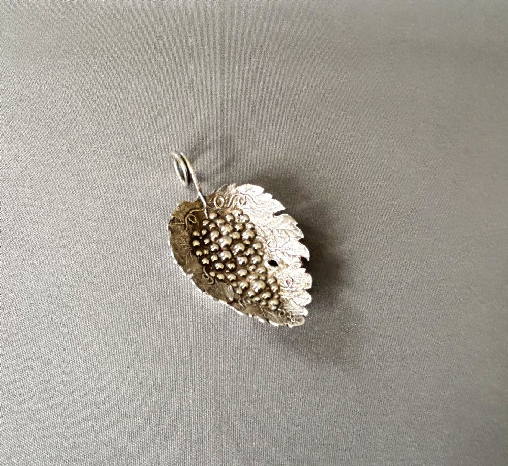 A desirable Georgian silver leaf caddy spoon
