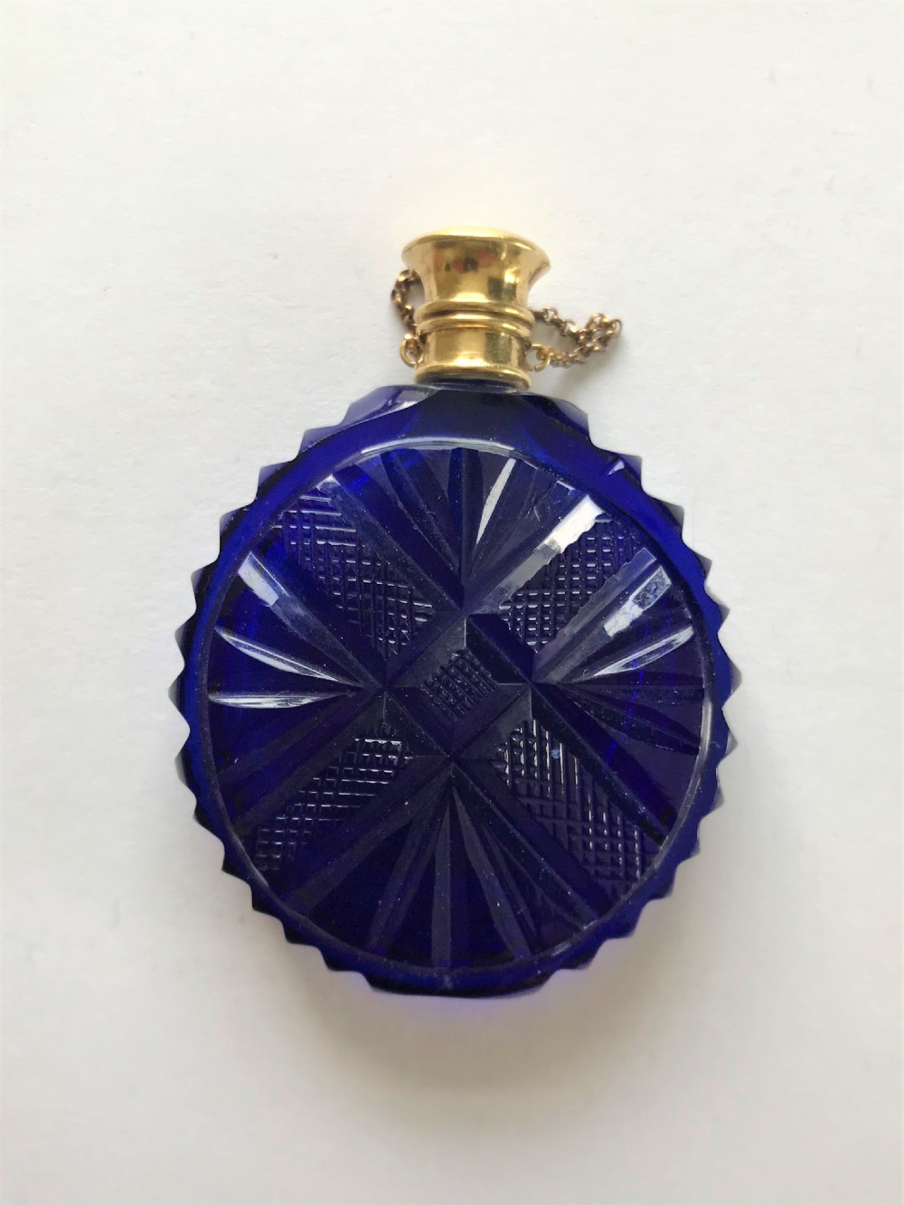 A gorgeous Victorian silver gilt mounted scent bottle